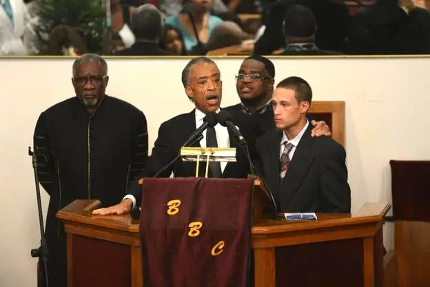 Rev. Sharpton speaking at the funeral of Eric Garner/ AP